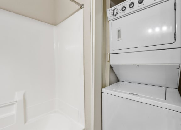 Stackable W/D next to Shower
