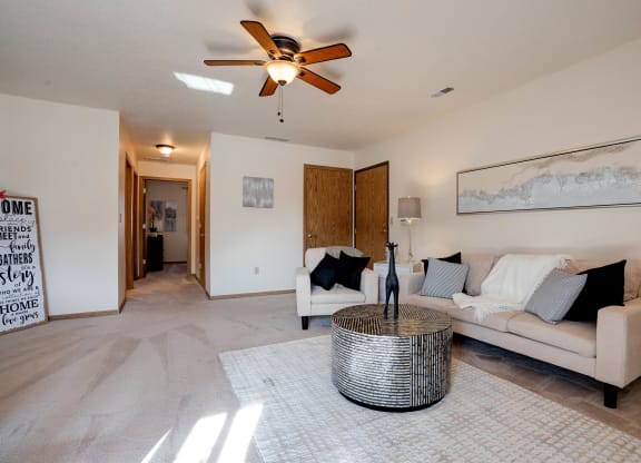 Living Room With Carpeted Hallway