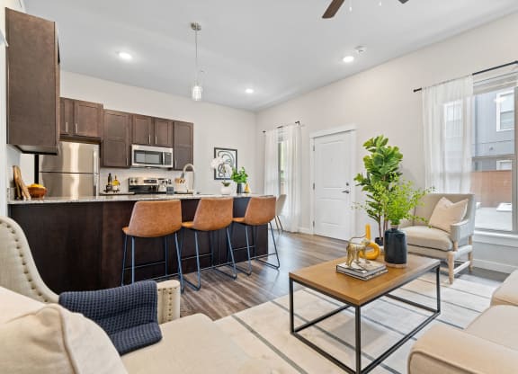 Spacious Living Area With Wood-Style Flooring