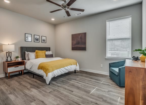 Large Bedroom with Wood-Style Flooring