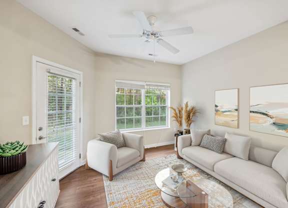 Spacious Living Area With Wood-Style Flooring