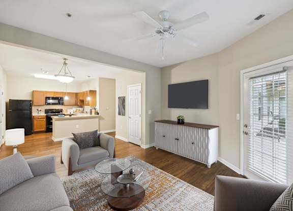 Spacious Living Area With Wood-Style Flooring
