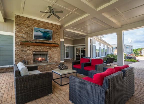 Poolside Lounge with Fireplace and Mounted TV