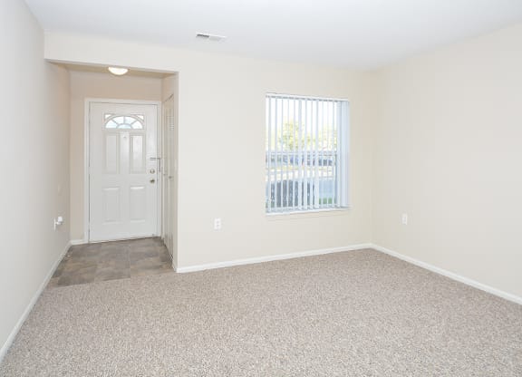 Apartment Home Entry Way with Closet and Tile Style Flooring