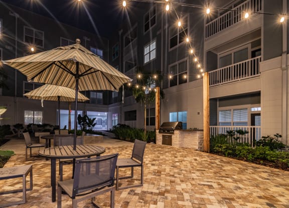Outdoor Pool Sundeck Lit Up At Night