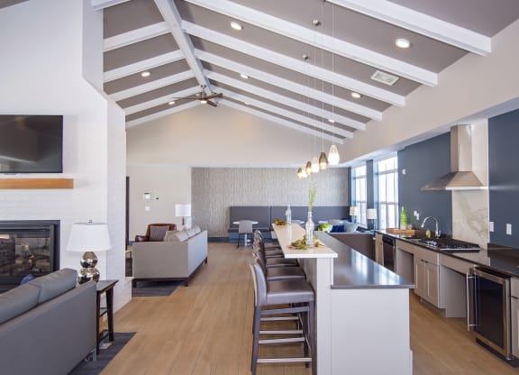 Large Clubroom with Multiple Lounges, Kitchen and Fireplace with Vaulted Ceilings