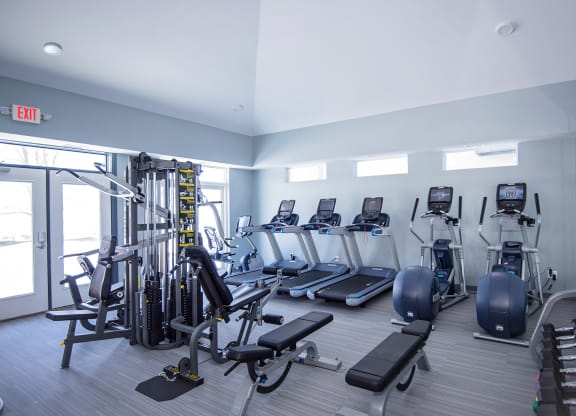 Spacious Fitness Center with Cardio and Strength Training Equipment