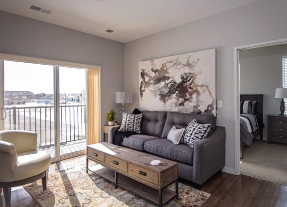Living Room with Wood Style Flooring and Tall Ceilings