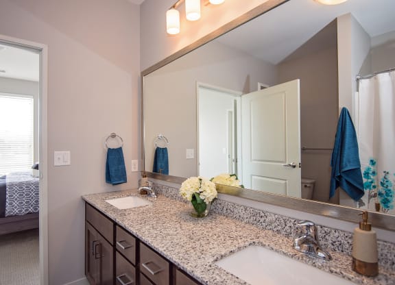 Spacious Bathroom Leading to an Attached Bedroom