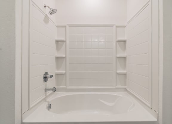 Tiled Shower With Built-In Shelving In The Shower