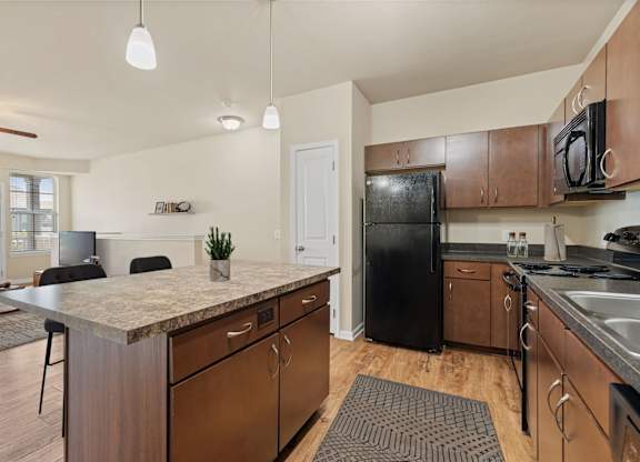 Kitchen with Dark Brown Cabinets