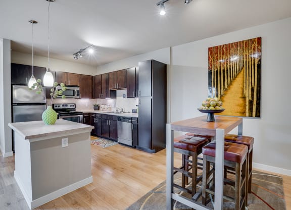 Spacious Kitchen with Island and Dining Area