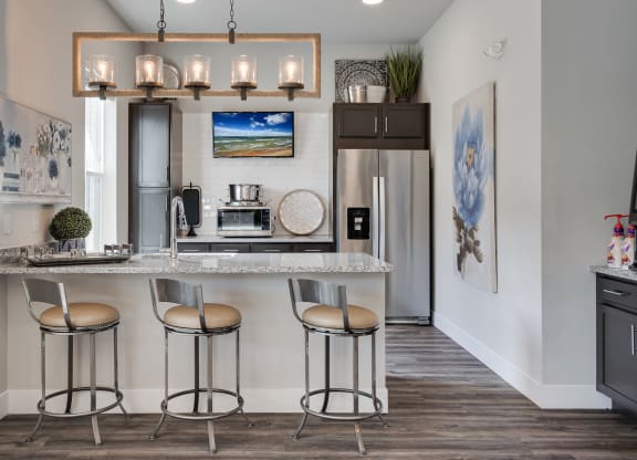 Clubhouse Kitchen With Stainless Steel Appliances & Granite Counters