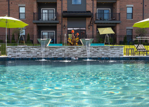 Resort-Style Pool With Fountains