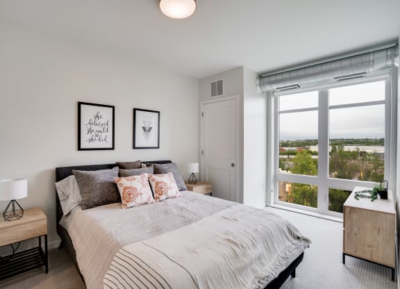 Large Floor to Ceiling Windows in Bedroom