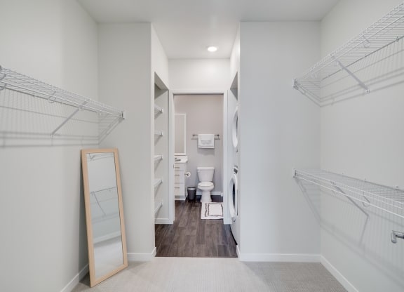 Large Walk-In Closet with Built-In Shelving