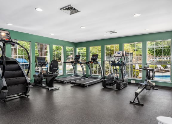 Cardio Equipment At The Fitness Center With Expansive Windows