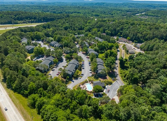 Aerial View Of The Halston Apartment Community With Pool