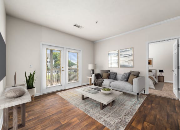 Spacious Living Area With Wood-Style Flooring