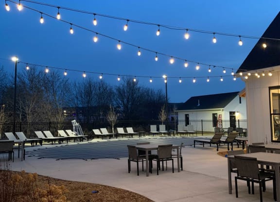 Outdoor Sundeck Lounge Under Twinkling Lights