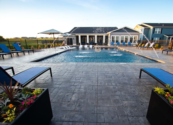 Clubhouse Overlooking The Resort-Style Pool & Sundeck