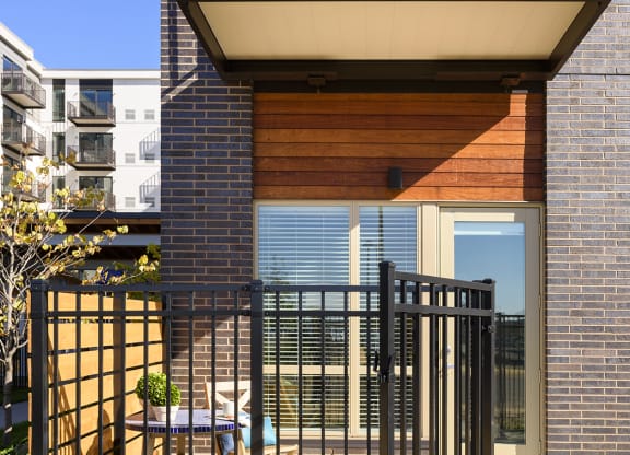 Fenced-In Patio With Privacy Wall