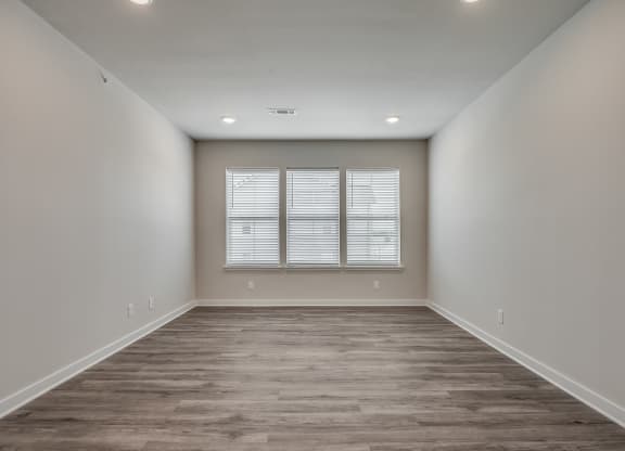 Spacious Living Room with Overhead Lighting