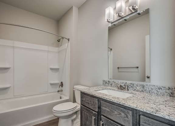 Bathroom With Granite Vanities