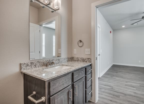Bathroom With Granite Vanities