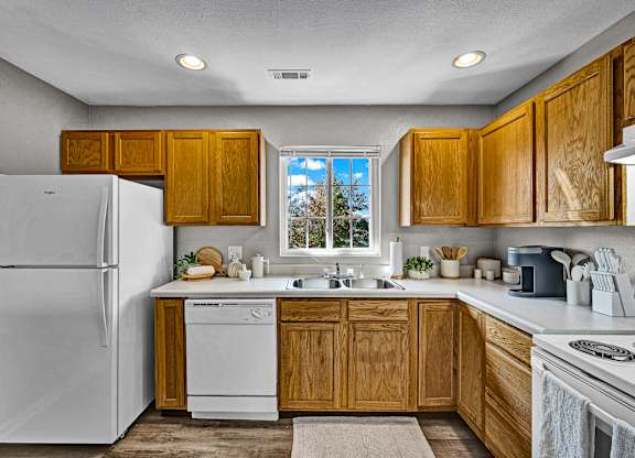 Fully-Equipped Kitchen with Wood Cabinets