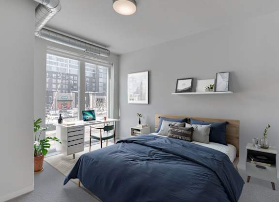 Bedroom with floor to ceiling windows
