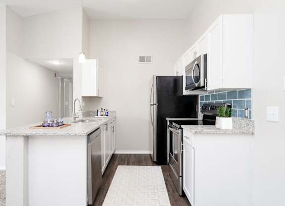Fully Equipped Kitchen with Stainless Steel Appliances