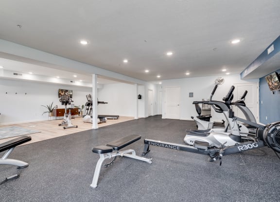 Rowing Machine & Bench At The Fitness Center