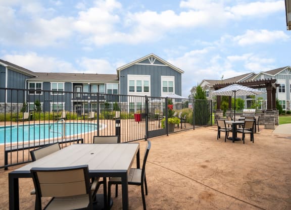 Outdoor Terrace Area Overlooking the Fenced In Pool
