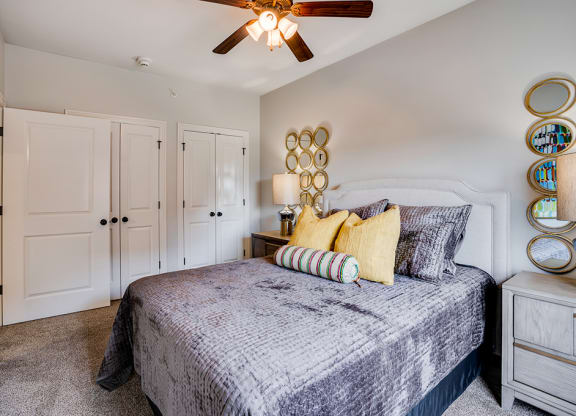 Bedroom with Ceiling Fan and Light
