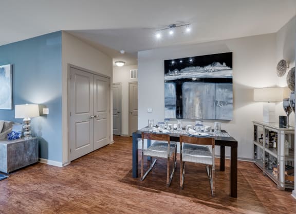 Spacious Dining Area With Wood-Style Flooring