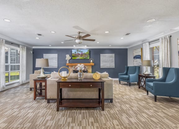 Clubhouse lounge with Mounted TV and Fireplace