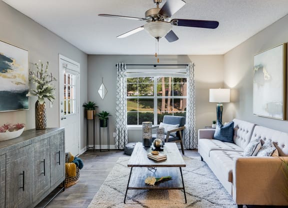Living Room with Lots of Natural Light and Hardwood Style Flooring
