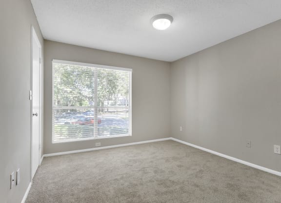 Spacious Bedroom with Large Windows