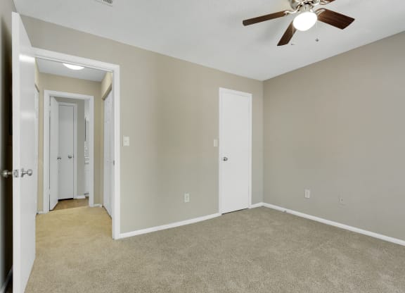 Spacious Bedroom With Ceiling Fan
