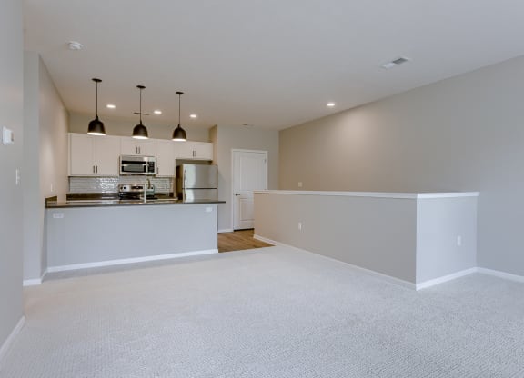 Spacious Living Area with Carpet