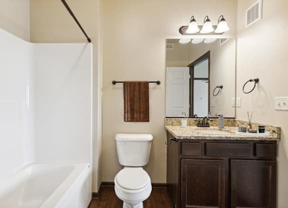 Bathroom with Dark Brown Cabinets