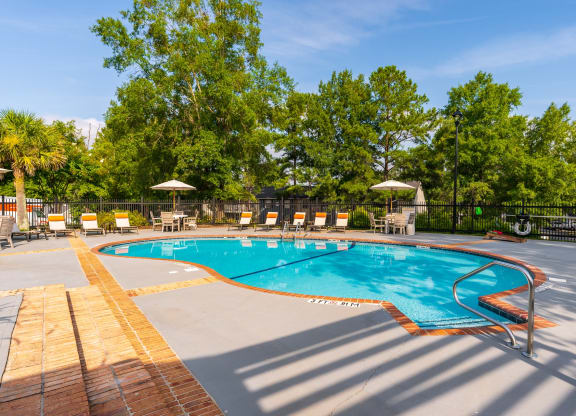 Outdoor Pool & Sundeck With Lounge Chairs