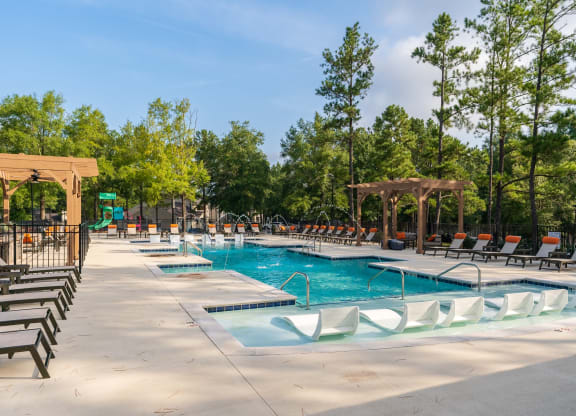 Zero-Entry Pool With Lounge Chairs In The Water