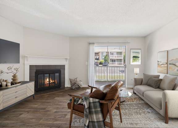 Spacious Living Area With Wood-Style Flooring