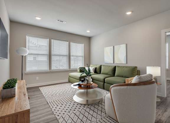 Spacious Living Area With Wood-Style Flooring
