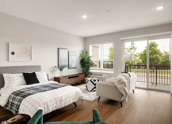 Spacious Living Area With Wood-Style Flooring