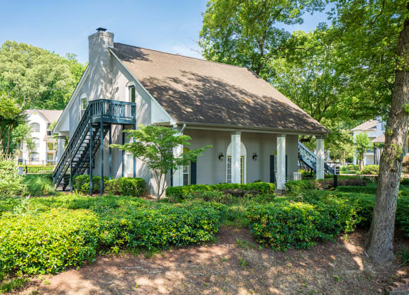 Leasing Center Surrounded by Lush Greenery and Landscaping