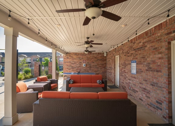 Covered Outdoor Lounge Area with Couches