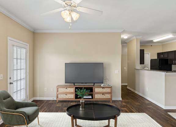 Spacious Living Area With Wood-Style Flooring
